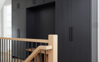 Mudroom grey cabinets and staircase